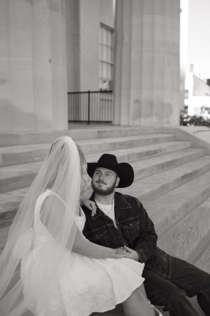 Bride and groom talking after courthouse elopement